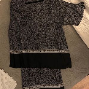 Two piece luxury brand outfit.